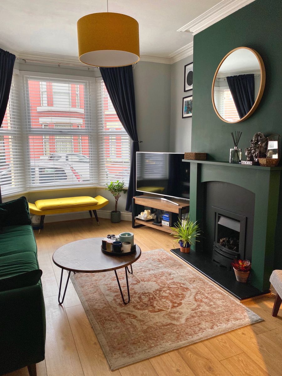 Terraced living room in emerald green